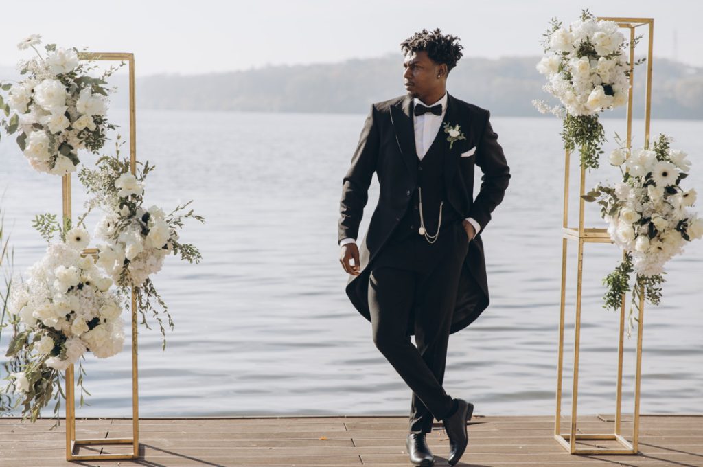 6-Fashion-forward groom in modern suit with artistic boutonniere